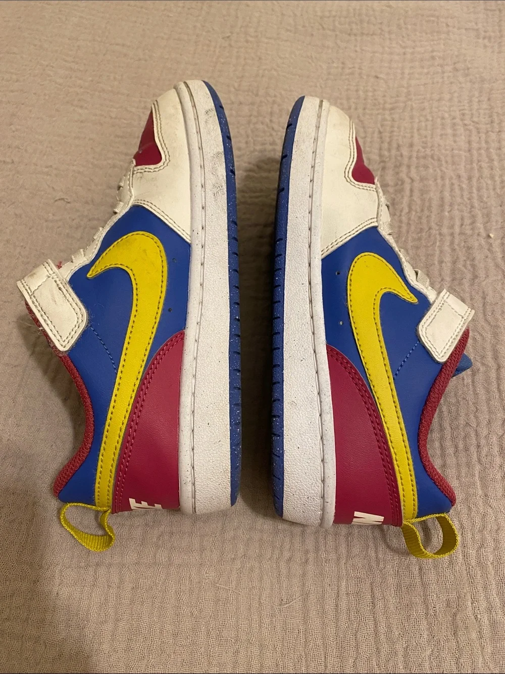 Nike Kids Low-Top Sneakers in White, Blue, Pink & Yellow. Size 13.5